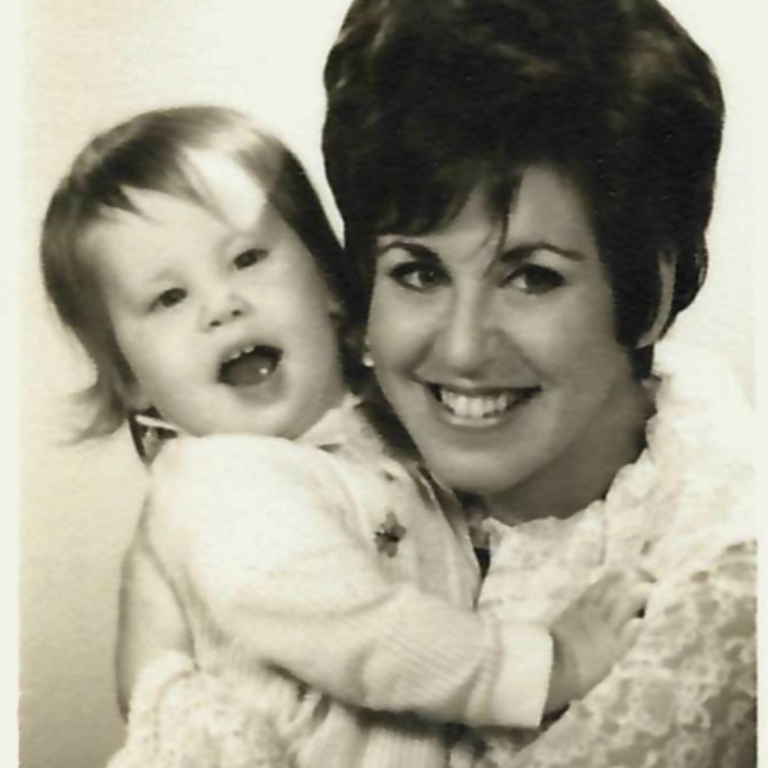 Mother with baby in black and white - heartbreaking loss.