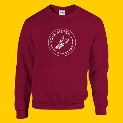 Front view red crew neck sweatshirt with Sole Sister Rambler logo.