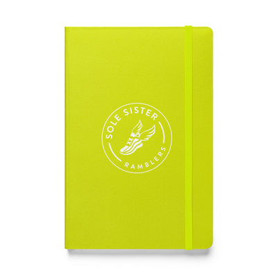 Royal safety green notebook with round Sole Sister Ramblers logo.