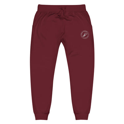 Front view of top maroonsweatpants with round Sole Sister Ramblers logo on top leg.